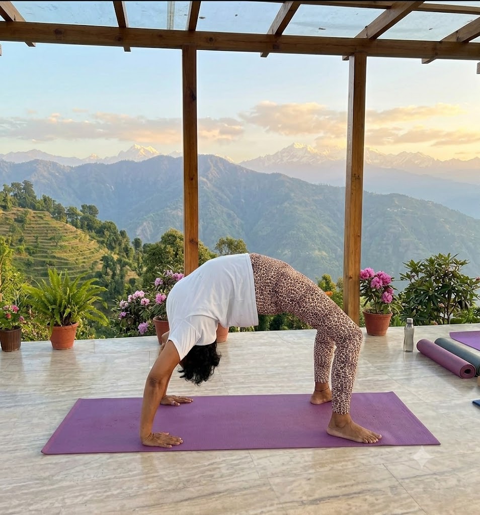 Practitioner in Chakrasana, the wheel pose, arching the body upward supported on hands and feet