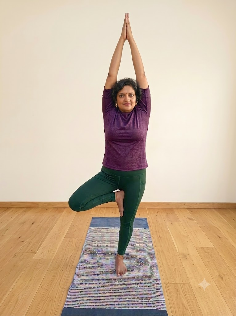 Person balancing in Vrikshasana, Tree Pose